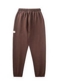 Rudi elastingi juosmens keliaraiščiai, pagaminti iš minkštos medžiagos. Turi laisvą pjūvį, siaurėjantys kojos ir mažą prekės ženklą šone.