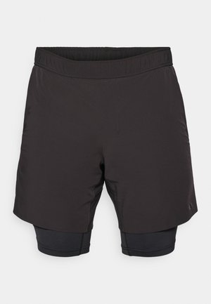 Black athletic shorts with an elastic waistband, featuring a shorter outer layer and a fitted inner layer, made from lightweight fabric.