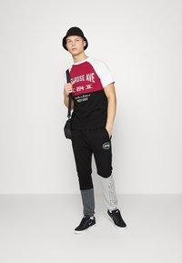 274 MELROSE  - Calças de fato de treino - black