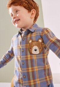Next Camicia - blue yellow character pocket shirt