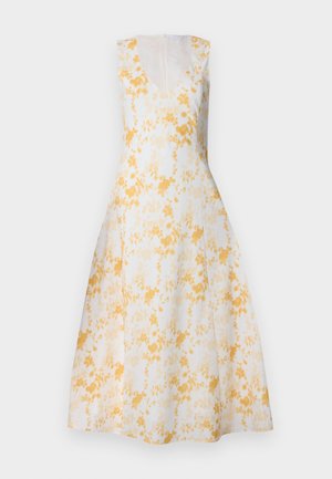 Varrvaba, V-kaelusega kleit valges kollaste lillemotiividega. A-linje kuju, põlvepikkune, peidetud seljaveskiga ja siledast tekstuurist.