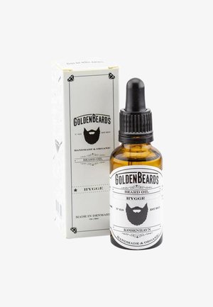 Amberglasflasche mit schwarzem Tropfer, beschriftet mit "Golden Beards Hygge Beard Oil", untergebracht in einem weißen Karton mit schwarzen Akzenten.