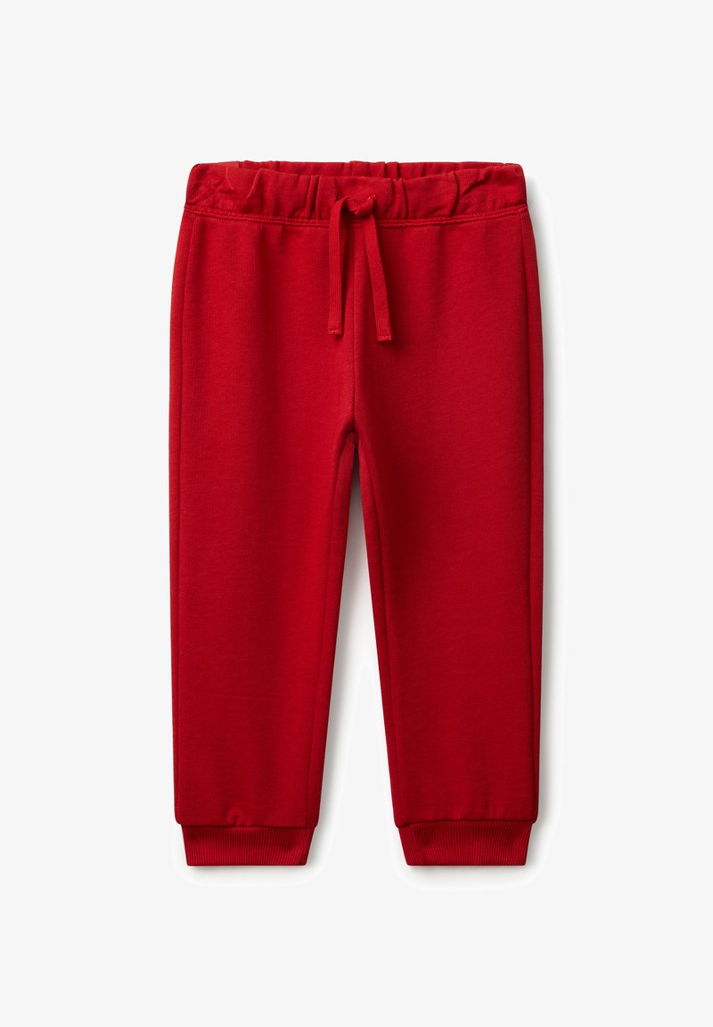 Pantalones jogger de algodón rojo brillante con cintura elástica, cordón ajustable y puños acanalados sobre un fondo blanco.