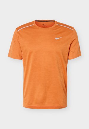 Short-sleeve orange Nike running shirt with round neck, subtle texture, and white Nike logo on the left chest.