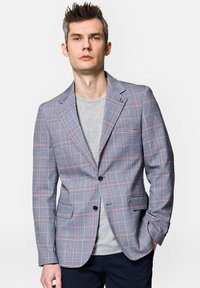 Tweedowa marynarka w kolorze niebieskim, szarym i czerwonym, z wyłogami, zapięciem na dwa guziki i kieszeniami; materiał mieszany z bawełny, o dopasowanym kroju.