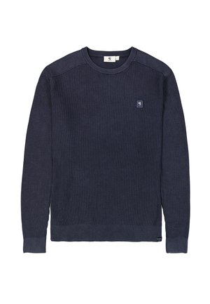 Suéter de punto azul marino con mangas largas, textura acanalada, cuello redondo y un pequeño parche con logo en el pecho. Presenta un diseño de color sólido.