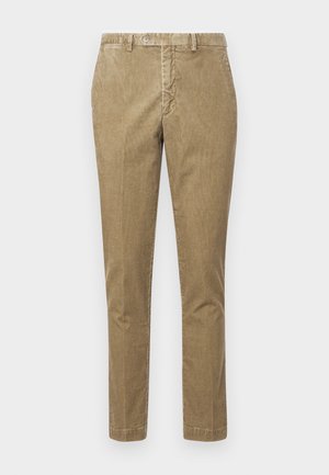 Pantalon en velours côtelé beige avec une coupe droite, doté d'une fermeture à boutonnage et de poches avant. Texture lisse avec un motif côtelé visible.