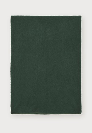 Mørkegrønt, rektangulært tæppe med en blød tekstur. Kanten er syet pænt, hvilket viser en glat finish. Minimalistisk design uden mønstre.