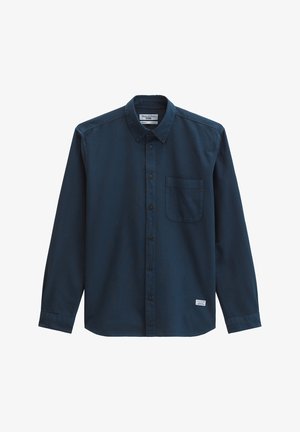 Donkerblauw overhemd met lange mouwen, knoopsluiting, voorzak op de borst en een kraag met knopen.