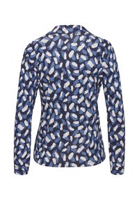 Maglietta a maniche lunghe in un tessuto blu scuro, caratterizzata da un motivo astratto sparso in diverse tonalità di blu e bianco. Tessuto liscio, orlo arrotondato.