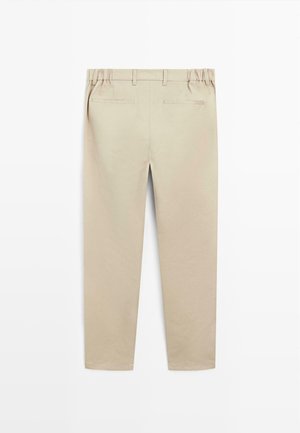 Beige straight-leg pants with elastic waistband, belt loops, and two back welt pockets, displayed against a white background.