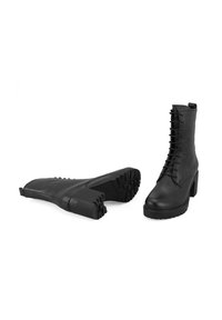 Desa Bottines à plateau - black