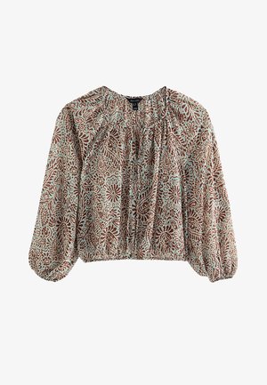 Blouse à manches longues avec poignets élastiques, motifs floraux et cachemire marron sur fond bleu clair, encolure froncée avec liens réglables.