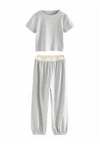 Gray cotton short-sleeve top with a straight cut and matching elastic-waist pants featuring tapered cuffs. Simple and casual design.
