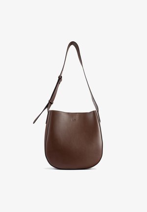 Brown leather shoulder bag with a smooth texture, curved shape, and adjustable strap. Features subtle branding on the front.