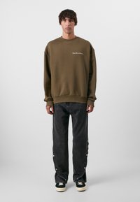 Don't Waste Culture MASON UNISEX - Loose fit -farkut - washed black