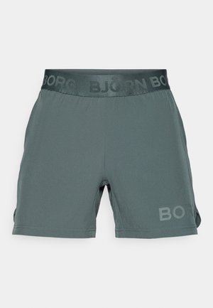 Lagana atletska kratka hlače u tamnoj sivoj boji, koje imaju elastičnu traku u struku s utisnutim natpisom 'BJÖRN'. Uključuju bočne proreze za bolju pokretljivost.