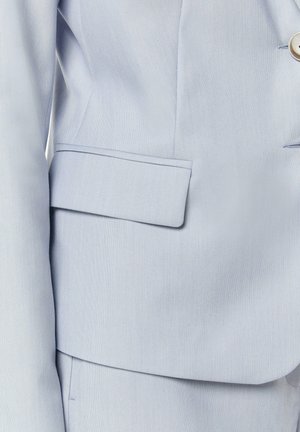 Light blue blazer with a textured finish, single button closure, and rectangular pocket detail. Smooth fabric with a tailored fit.