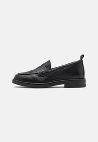 Black leather loafer with a smooth texture, rounded toe, and stitched detailing across the vamp. Features a low, flat rubber sole.