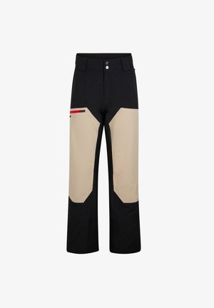 Schwarze und beige Hosen mit gerader Passform. Zu den Merkmalen gehören verstärkte Knie, eine Seitentasche mit roten Akzenten und ein Knopfverschluss.