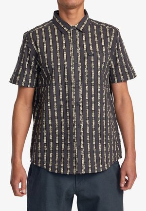 Short-sleeve button-up shirt in dark fabric with vertical cream patterns, featuring a collar and front buttons, smooth texture.
