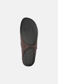 Brown leather shoe outsole with subtle texture, featuring a rounded shape and molded rubber grip, marked with "PER" and size "38."