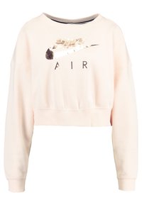 Zkrácená mikina z měkké růžové látky, s kovovým logem Nike a textem "AIR". Dlouhé rukávy s žebrovanými manžetami. Jednoduchý, sportovní design.