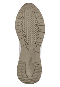Suola di una sneaker realizzata in materiale gommoso testurizzato nei colori beige e bianco, con un battistrada patternizzato per trazione e supporto.