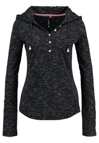 Dam långärmad svart hoodie med vita streck, knappslå, dragsko med rosa pärlor och rundad nederkant.