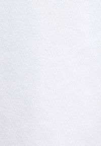 White fabric with a smooth texture and consistent weave, showing subtle variations in light. No visible patterns or fasteners.
