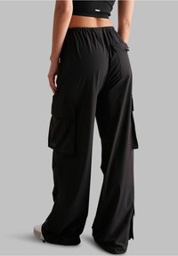 aim’n® Cargobyxor - black