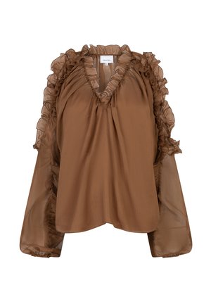 Blouse marron avec un col en V, ornée de volants le long du décolleté et des manches. Confectionnée dans un matériau léger et transparent avec une coupe fluide.