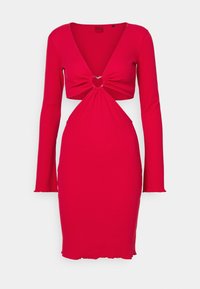 Red ribbed long-sleeve dress featuring a deep V-neck, heart-shaped cutout detail, and form-fitting silhouette with a frayed hem.