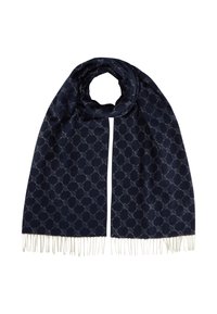 Navy blue scarf made of soft fabric, featuring a repeated geometric pattern, with white fringe accents at the ends.