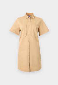 Φόρεμα πουκάμισο χακί με γιακά, κοντά μανίκια και κουμπιά μπροστά. Διαθέτει δύο τσέπες στο στήθος και στρογγυλεμένη γραμμή κάτω.