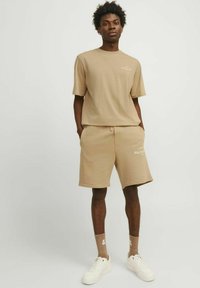 Jack & Jones PREMIUM Pantaloni sportivi - beige