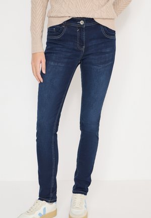 - Jeansy Slim Fit