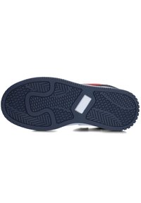 Rubberen schoenzool in donker marineblauw met gemêleerde grip patronen, met een platte vorm en een kleine witte accent nabij de tussenzool.