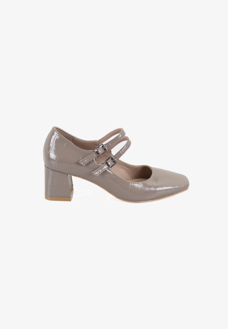 Beige Lackleder Mary Jane Absatzschuhe mit quadratischer Zehenpartie, zwei verstellbaren Riemen mit Schnallen und einem strukturierten Blockabsatz.