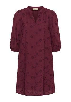 Burgundy dress with a V-neck, gathered puff sleeves, and floral embroidery. Fabric appears lightweight with a soft texture, knee-length design.