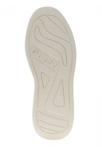 Kremowa gumowa podeszwa sportowa z wyraźnym wzorem bieżnika i wytłoczonym logo "GUESS". Smukły, zaokrąglony kształt z licznymi rowkami dla lepszej przyczepności.