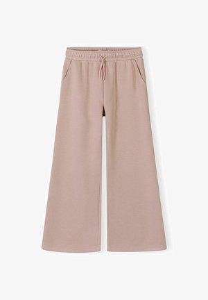 Pantalon beige à jambes larges avec taille élastique et cordon de serrage, doté de poches latérales, présenté sur un fond blanc.