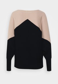 Knit sweater featuring a color-block design with light beige and navy blue sections, rounded neckline, and dropped shoulders. Smooth texture.