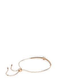 Justerbar armband i guldton med runda pärlor och en glidknäppning för storleksanpassning, med en slät och polerad yta.