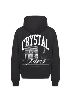 Black hoodie featuring a graphic of the Arc de Triomphe and Eiffel Tower, with "CRYSTAL PARIS" text in bold white and cursive lettering.