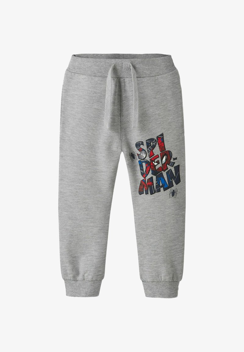 Pantalon de survêtement gris pour enfants avec taille et poignets élastiques, arborant un texte "Spider-Man" multicolore et de petits graphismes d'araignée sur la jambe droite.