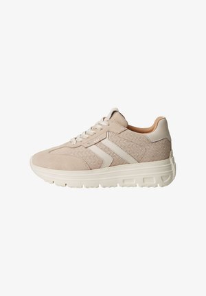 Beige athletic shoe featuring a textured suede upper, synthetic accents, a thick rubber sole, and a lace-up design.
