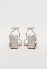 ALDO CHICGLOW  PILLOW WALK - Sandale s visokom petom - silver