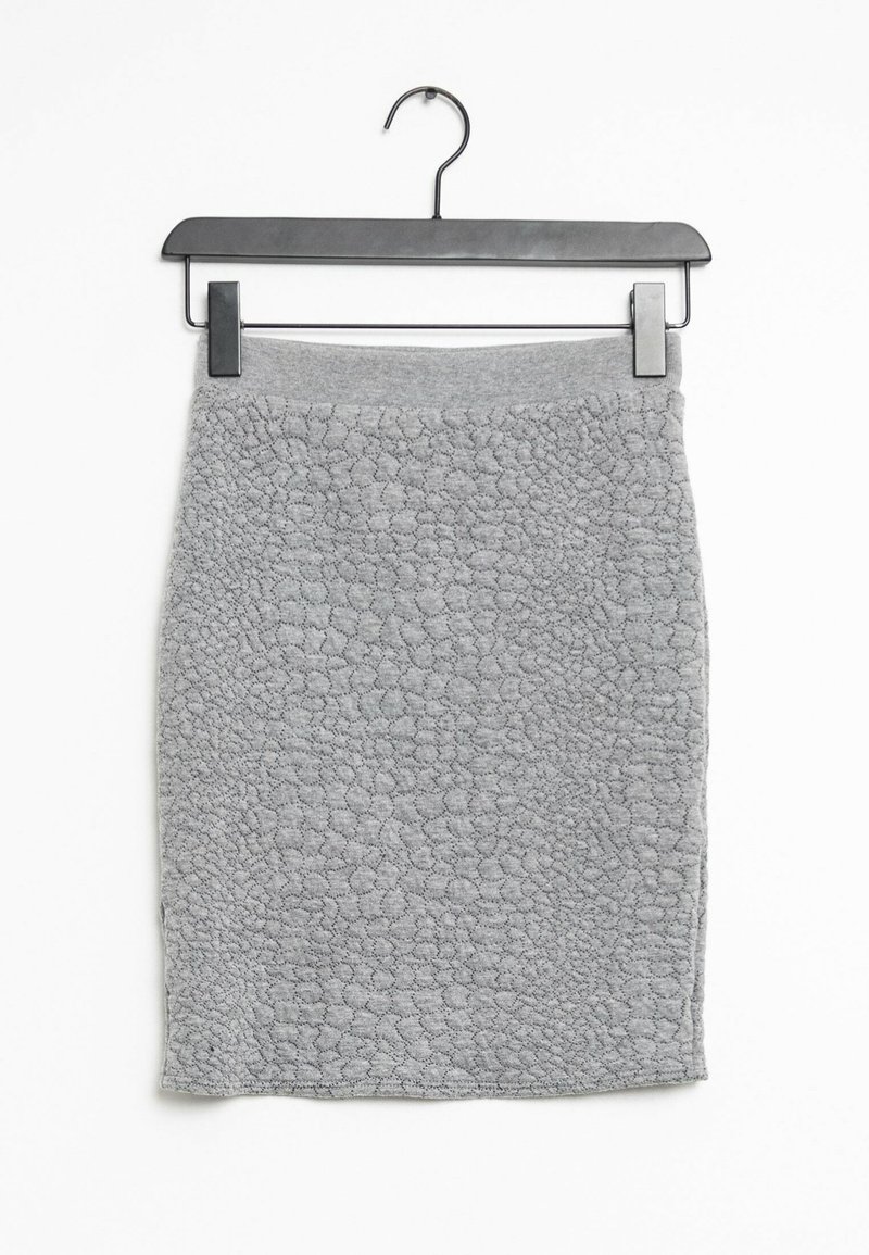 Gray textured skirt with a bubble-like pattern, soft material, and a fitted design. Hangs from a black metal hook.