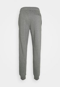 Graue Sweatpants aus Jersey mit elastischem Bund, schmal zulaufenden Bündchen und einer Gesäßtasche auf der rechten Seite. Weicher Stoff, lässiges Design.